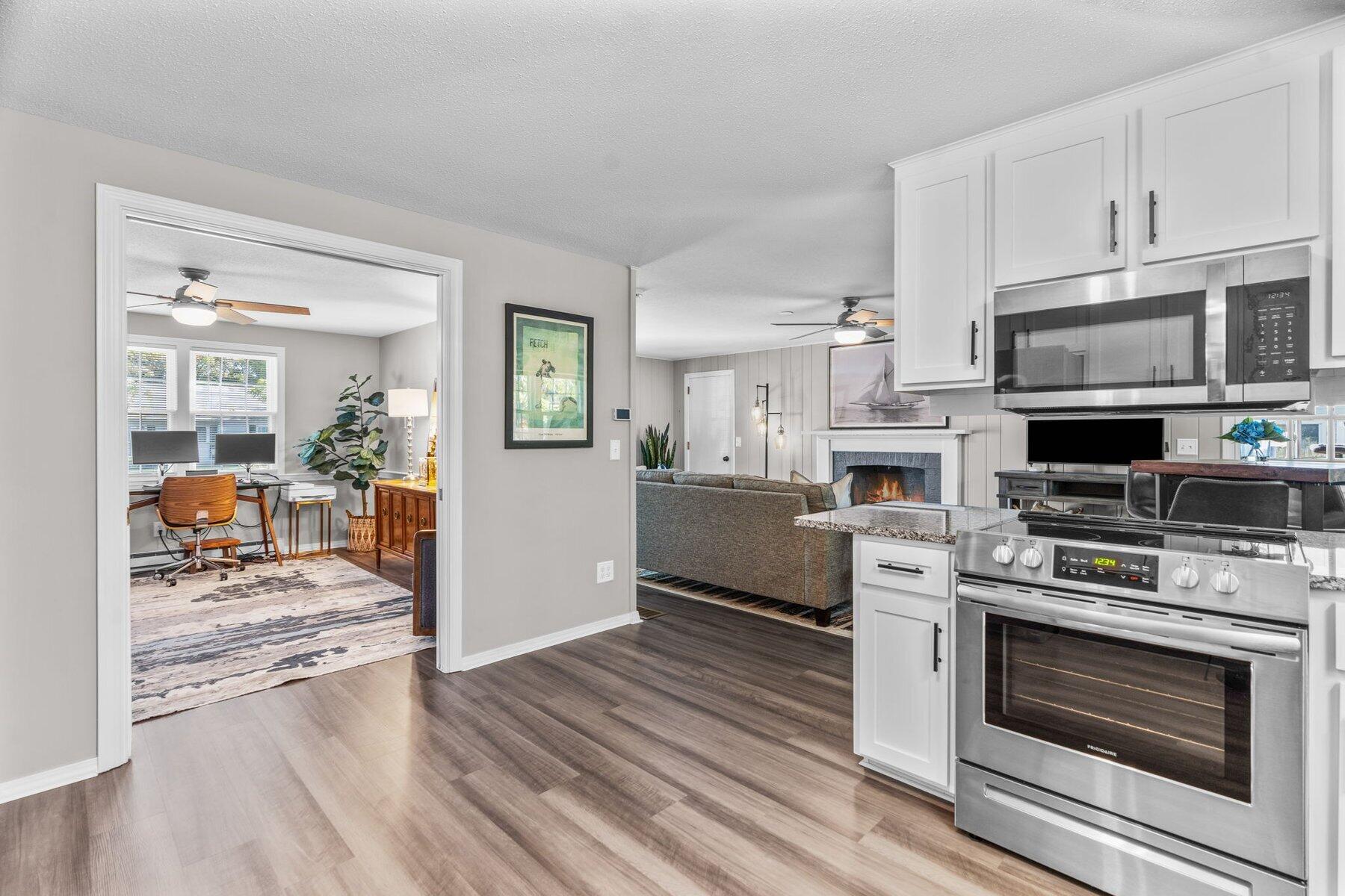 315 Prince Hinckley Road Centerville, MA 02632 - Photo 12 of 39 a kitchen with stainless steel appliances a stove a sink and a refrigerator