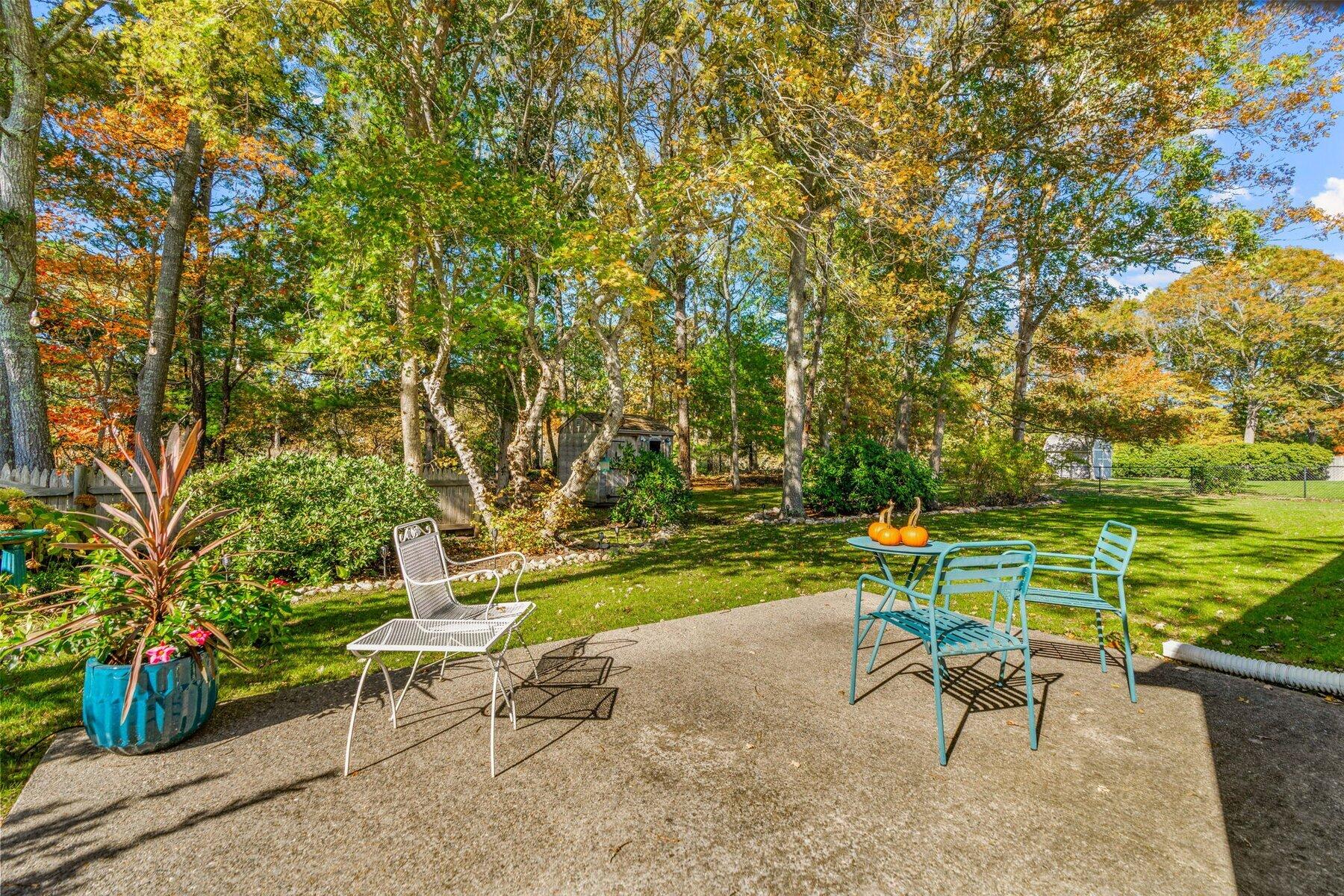 315 Prince Hinckley Road Centerville, MA 02632 - Photo 36 of 39 a view of a bench in a garden
