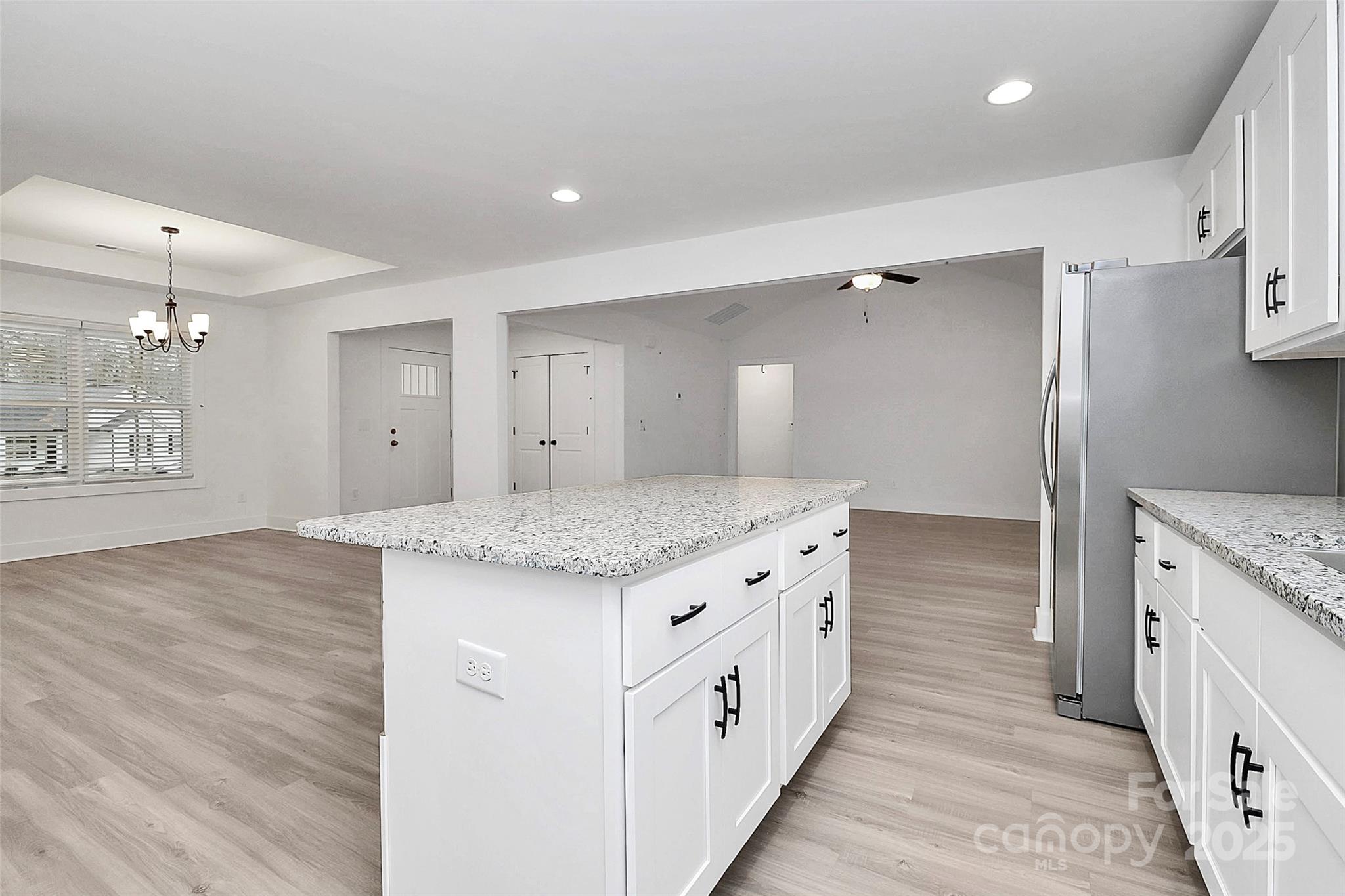 6259 Long Branch Road Salisbury, NC 28147 - Photo 11 of 48 a spacious bathroom with a granite countertop sink a mirror and a shower