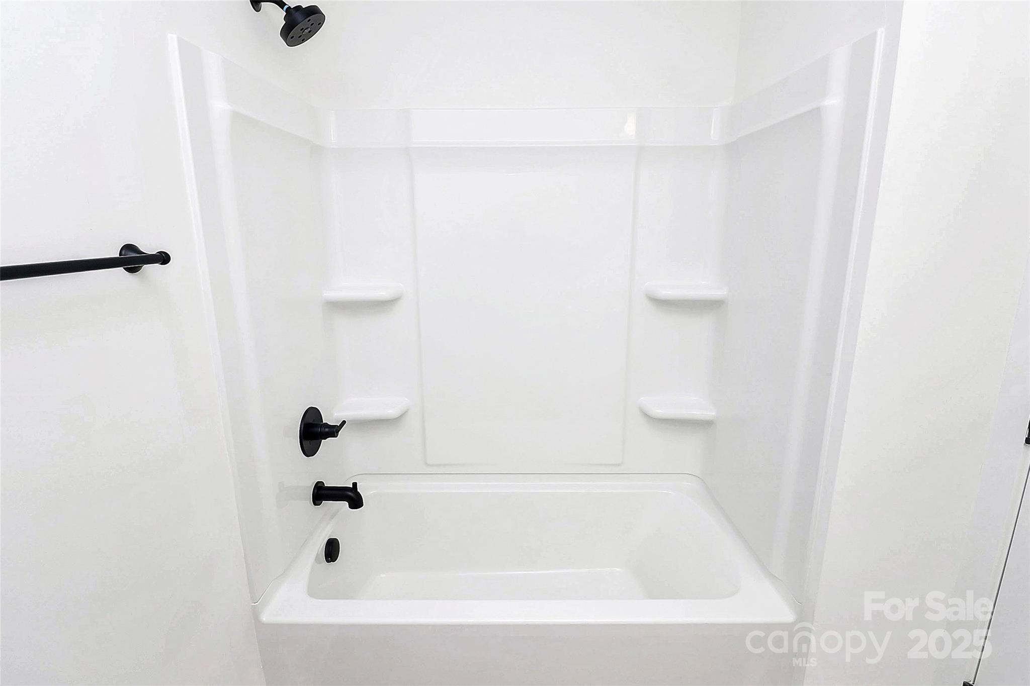 6259 Long Branch Road Salisbury, NC 28147 - Photo 31 of 48 a bathroom with a bathtub
