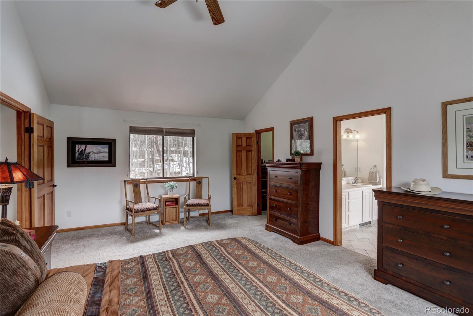 105 Desperado Road Bailey, CO 80421 - Photo 27 of 40 a living room with furniture and a window
