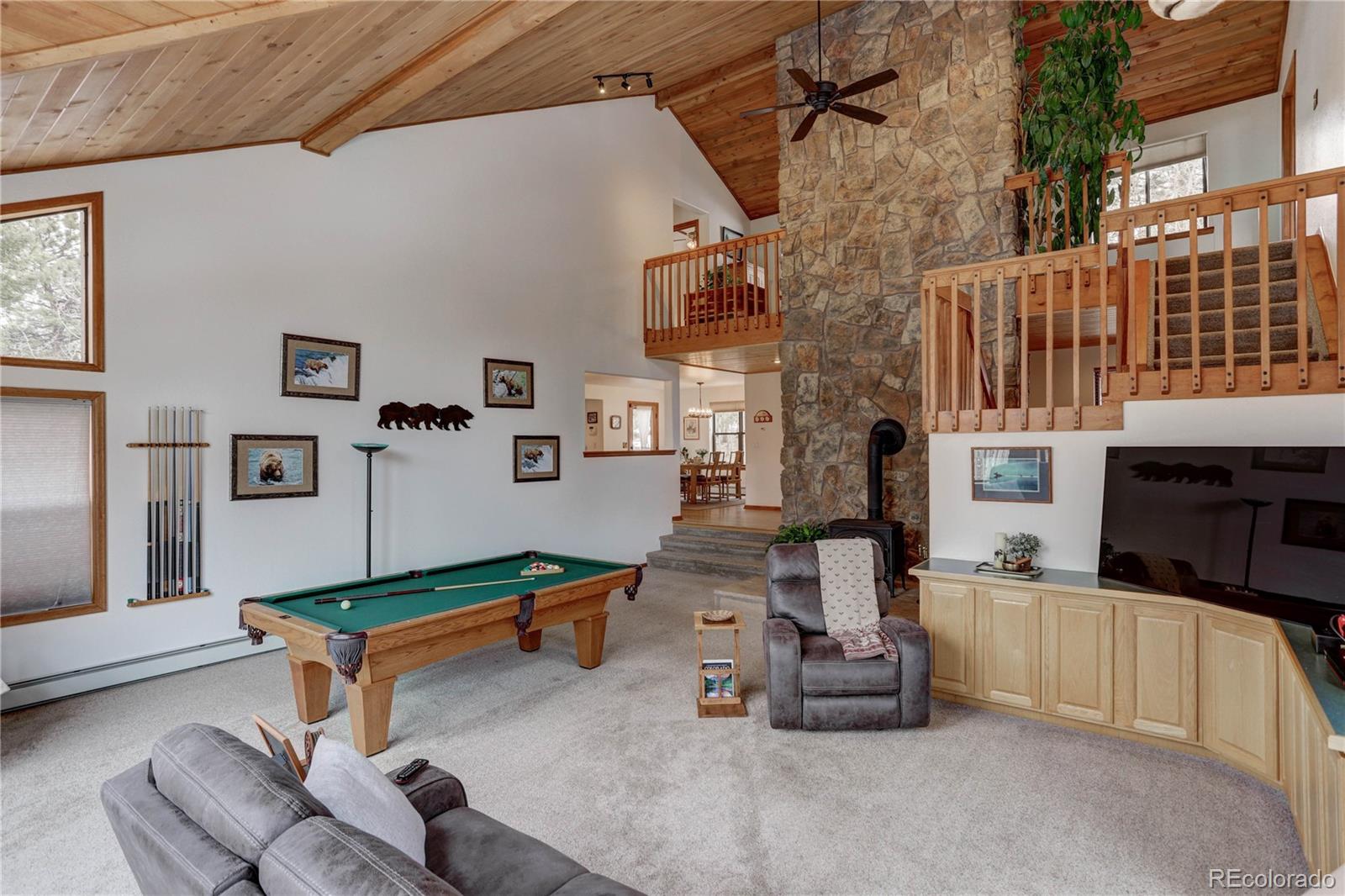 105 Desperado Road Bailey, CO 80421 - Photo 10 of 40 a living room with furniture
