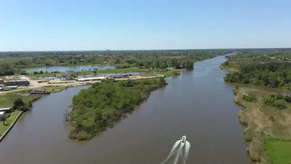 a view of a lake with a house