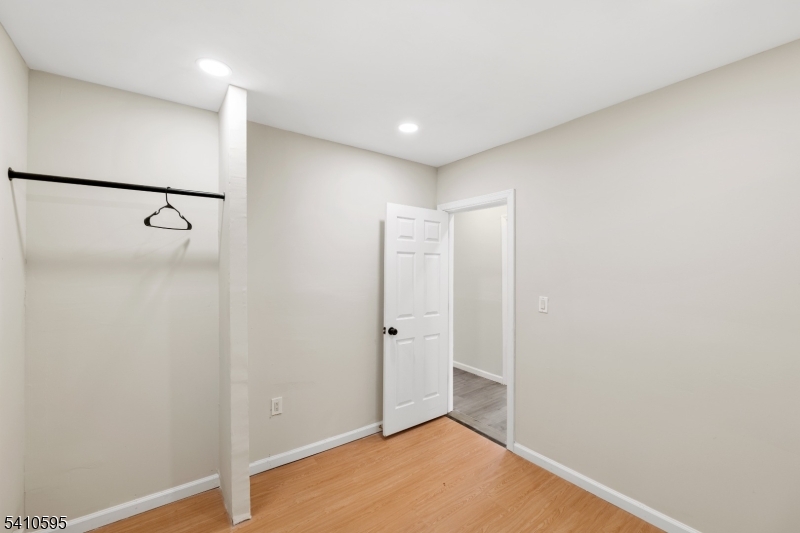 335 Boulevard Passaic, NJ 07055 - Photo 17 of 35 a view of a room with wooden floor