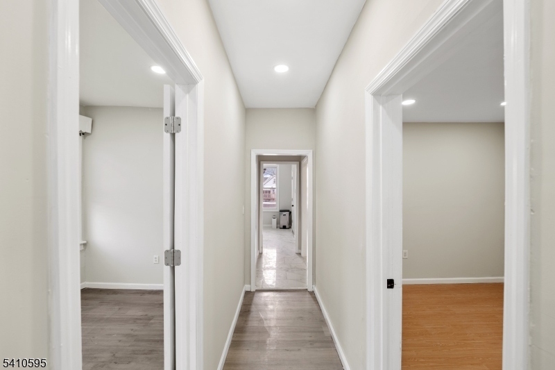 335 Boulevard Passaic, NJ 07055 - Photo 20 of 35 a view of a hallway with wooden floor