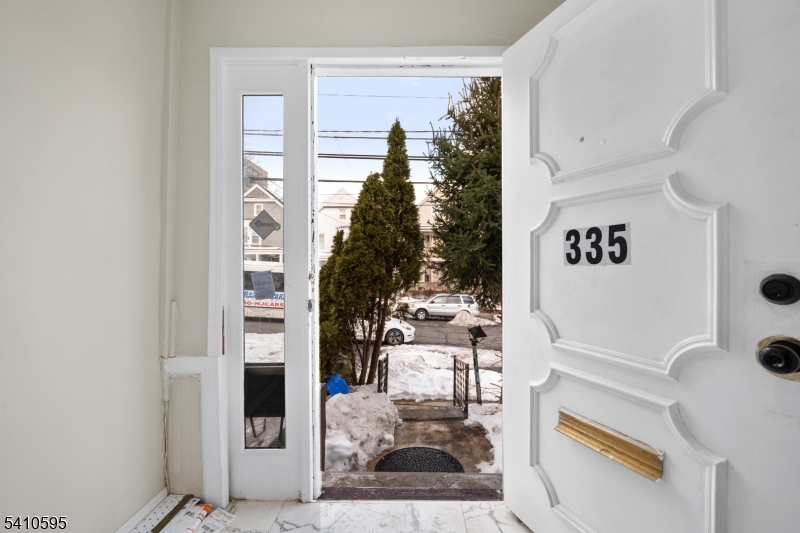 335 Boulevard Passaic, NJ 07055 - Photo 2 of 35 view of living room with furniture and rug