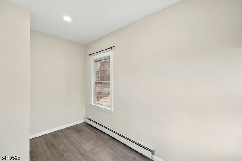 335 Boulevard Passaic, NJ 07055 - Photo 22 of 35 an empty room with windows