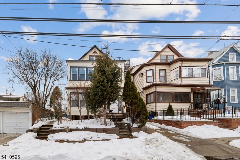 335 Boulevard Passaic, NJ 07055 - Photo 26 of 35 a backyard of a house with fire pit and chairs