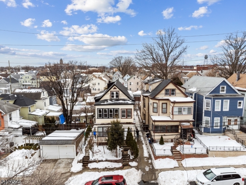 335 Boulevard Passaic, NJ 07055 - Photo 27 of 35 a front view of a building with a lot of trees