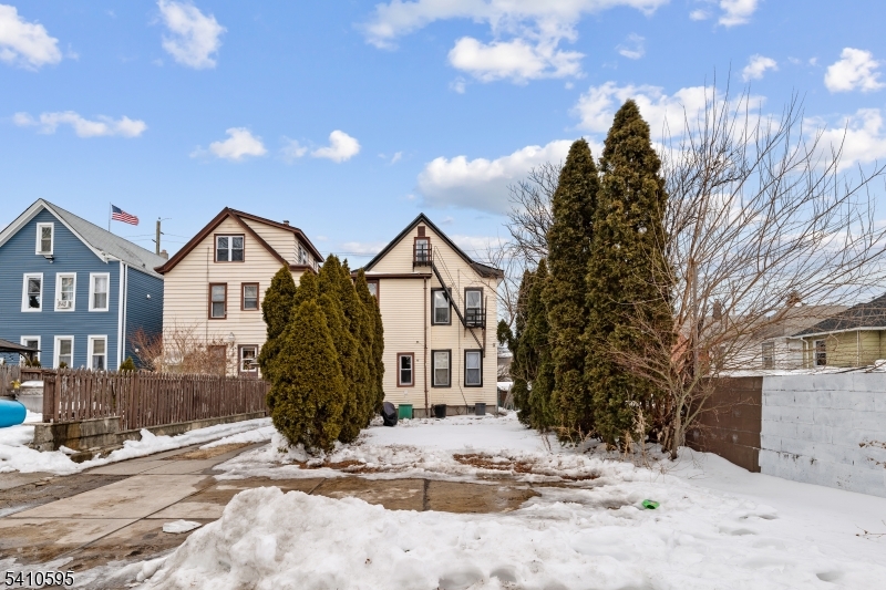 335 Boulevard Passaic, NJ 07055 - Photo 31 of 35 a view of a house with snow on the side of the road