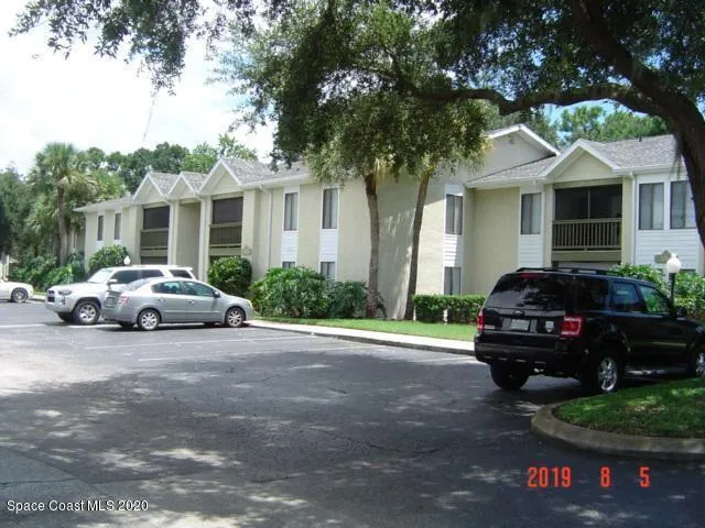 a car parked in front of a house