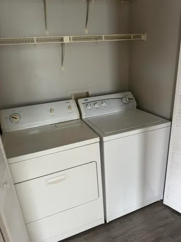 a utility room with dryer and washer