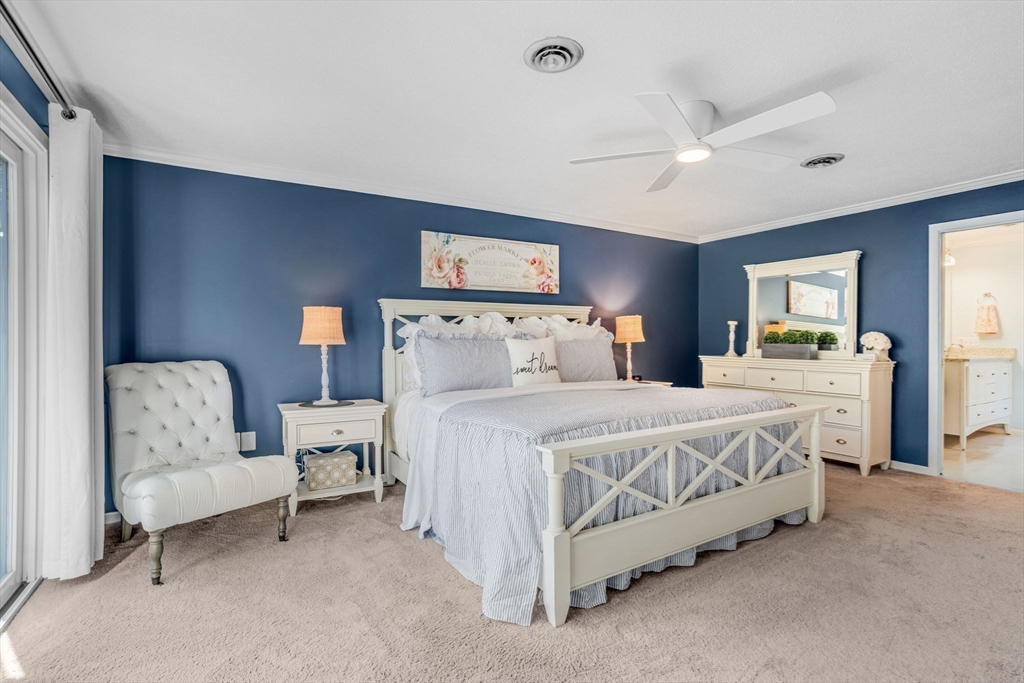 14 Hawthorne Village, Unit D Franklin, MA 02038 - Photo 22 of 42 a bedroom with a bed and a couch