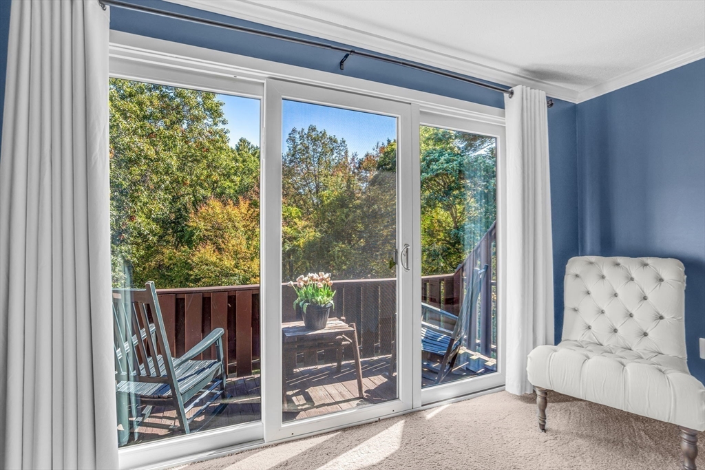 14 Hawthorne Village, Unit D Franklin, MA 02038 - Photo 24 of 42 a living room with furniture and a window