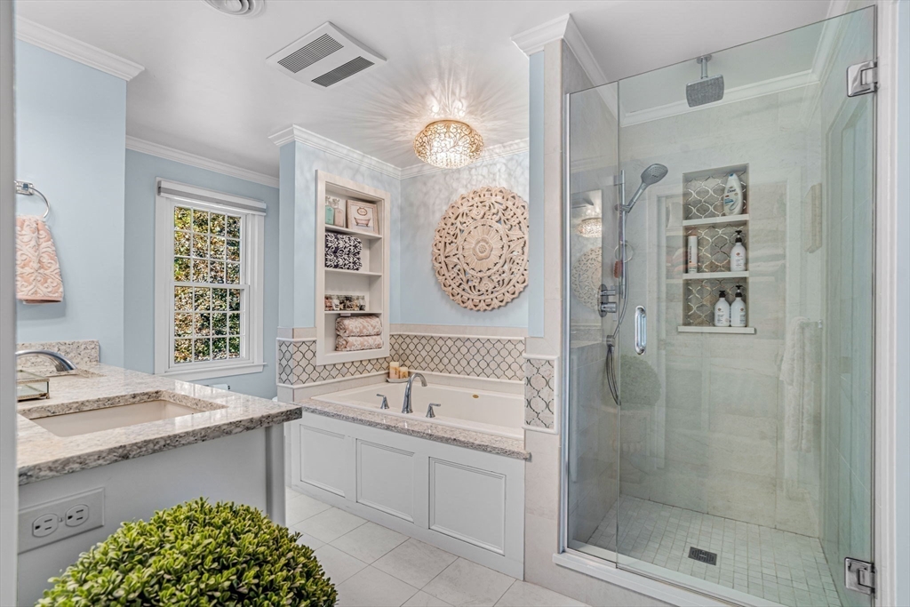 14 Hawthorne Village, Unit D Franklin, MA 02038 - Photo 27 of 42 a bathroom with a sink a toilet and shower