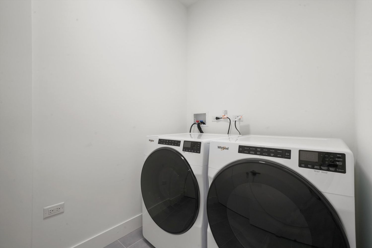 323 South Racine Avenue, Unit 3C Chicago, IL 60607 - Photo 17 of 18 a utility room with dryer and washer