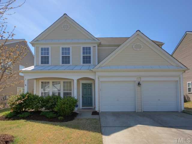 7409 Lagrange Drive Raleigh, NC 27613 - Photo 1 of 25 a front view of a house with garden