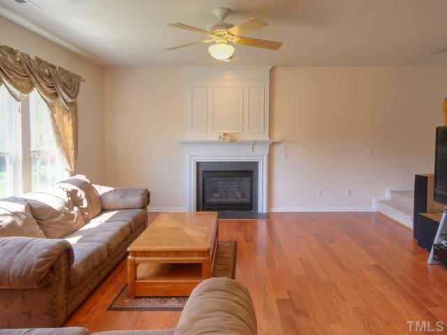 7409 Lagrange Drive Raleigh, NC 27613 - Photo 11 of 25 a living room with furniture and a fireplace