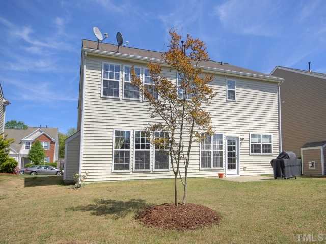 7409 Lagrange Drive Raleigh, NC 27613 - Photo 20 of 25 a front view of a house with a yard