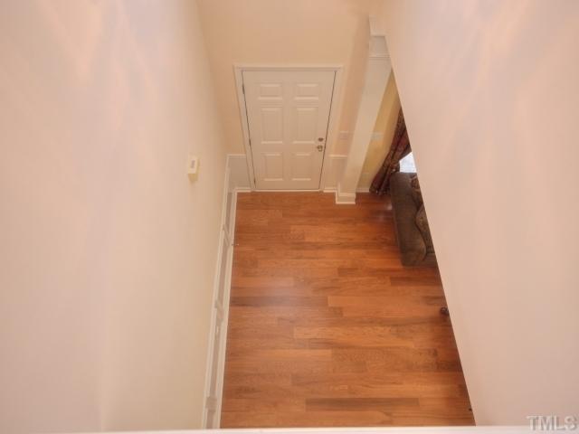 7409 Lagrange Drive Raleigh, NC 27613 - Photo 3 of 25 a view of gallery with wooden floor