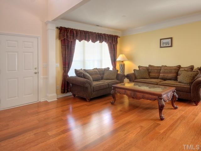 7409 Lagrange Drive Raleigh, NC 27613 - Photo 4 of 25 a living room with furniture and a large window