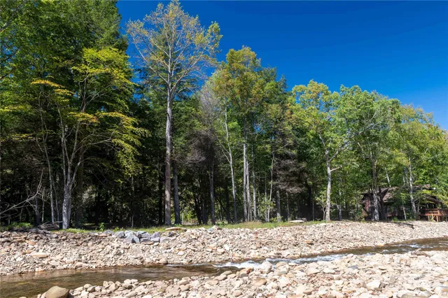 a view of a yard covered with snow