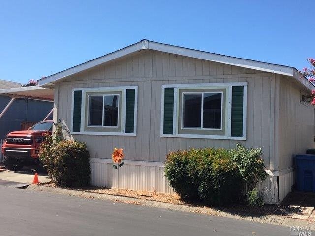 5319 Rexford Way, Unit 5319 Santa Rosa, CA 95403 - Photo 1 of 1 Front of Mobile Home. See Carport on the left has extra extended supports for wider vehicles that owner upgraded to.