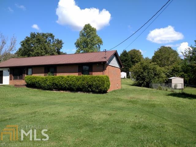 a view of a house with a big yard
