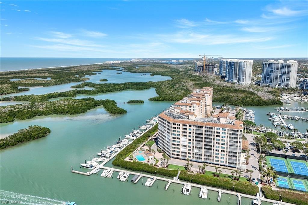 425 Dockside Drive, Unit 604 Naples, FL 34110 - Photo 26 of 34 a view of a lake with a city