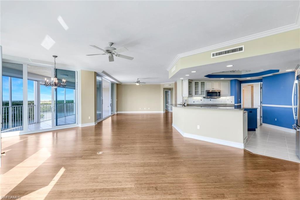 425 Dockside Drive, Unit 604 Naples, FL 34110 - Photo 4 of 34 a view of a kitchen with a sink and a large window