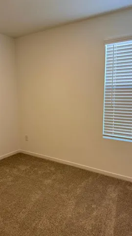 a bathroom with a toilet and a bathtub