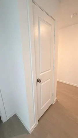 a bathroom with a tub shower and vanity