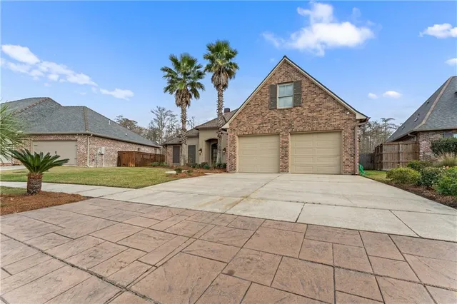 $725,000 | 21472 Blue Marlin Drive, Springfield, LA 70462