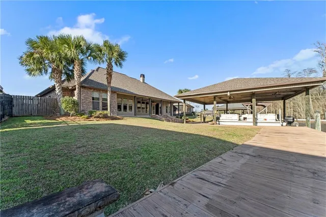 $725,000 | 21472 Blue Marlin Drive, Springfield, LA 70462