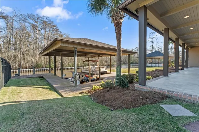 $725,000 | 21472 Blue Marlin Drive, Springfield, LA 70462