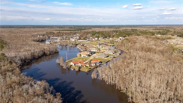 $725,000 | 21472 Blue Marlin Drive, Springfield, LA 70462