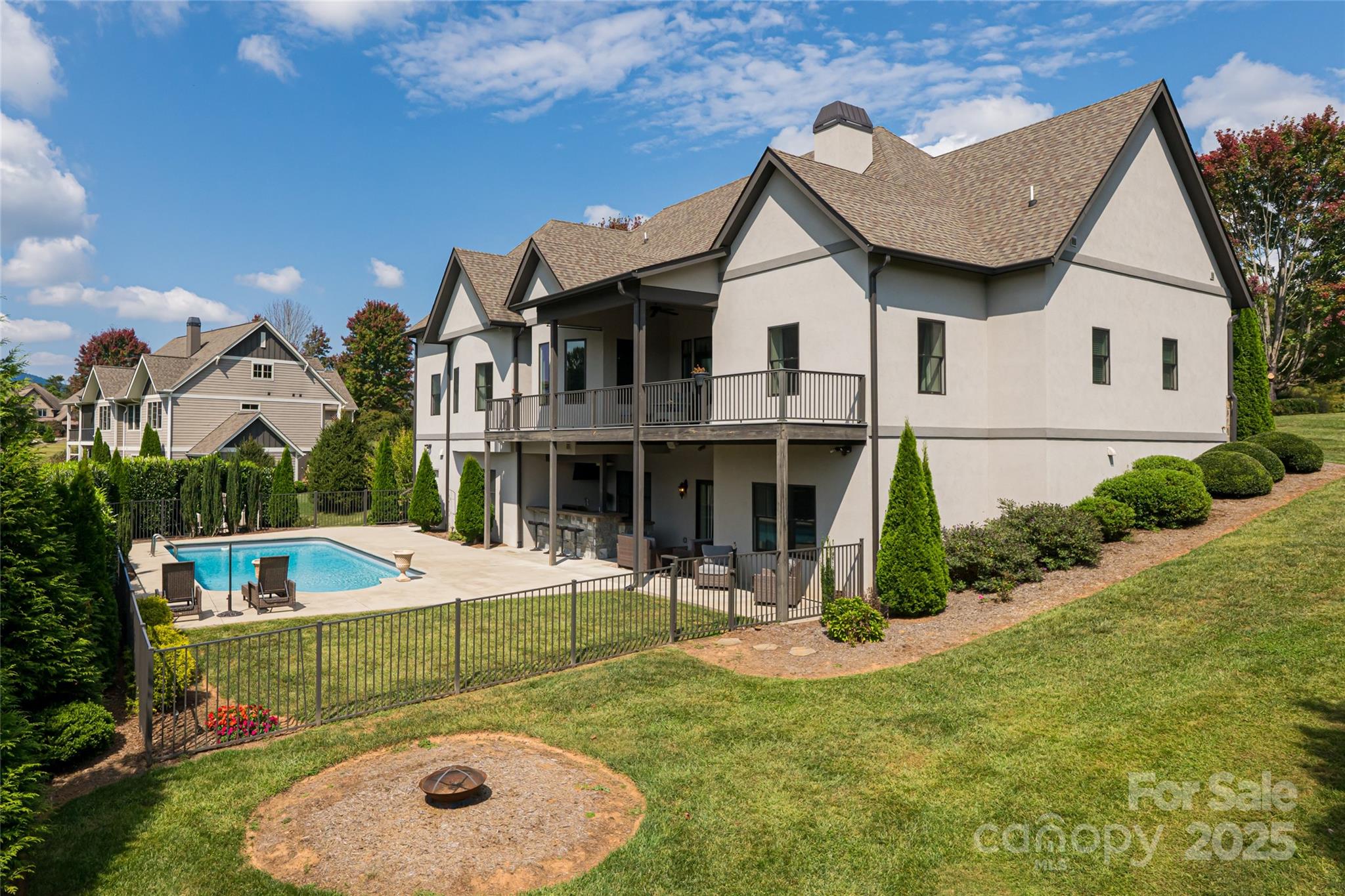 64 Waterhill Way Fletcher, NC 28732 - Photo 2 of 48 a front view of a house with garden