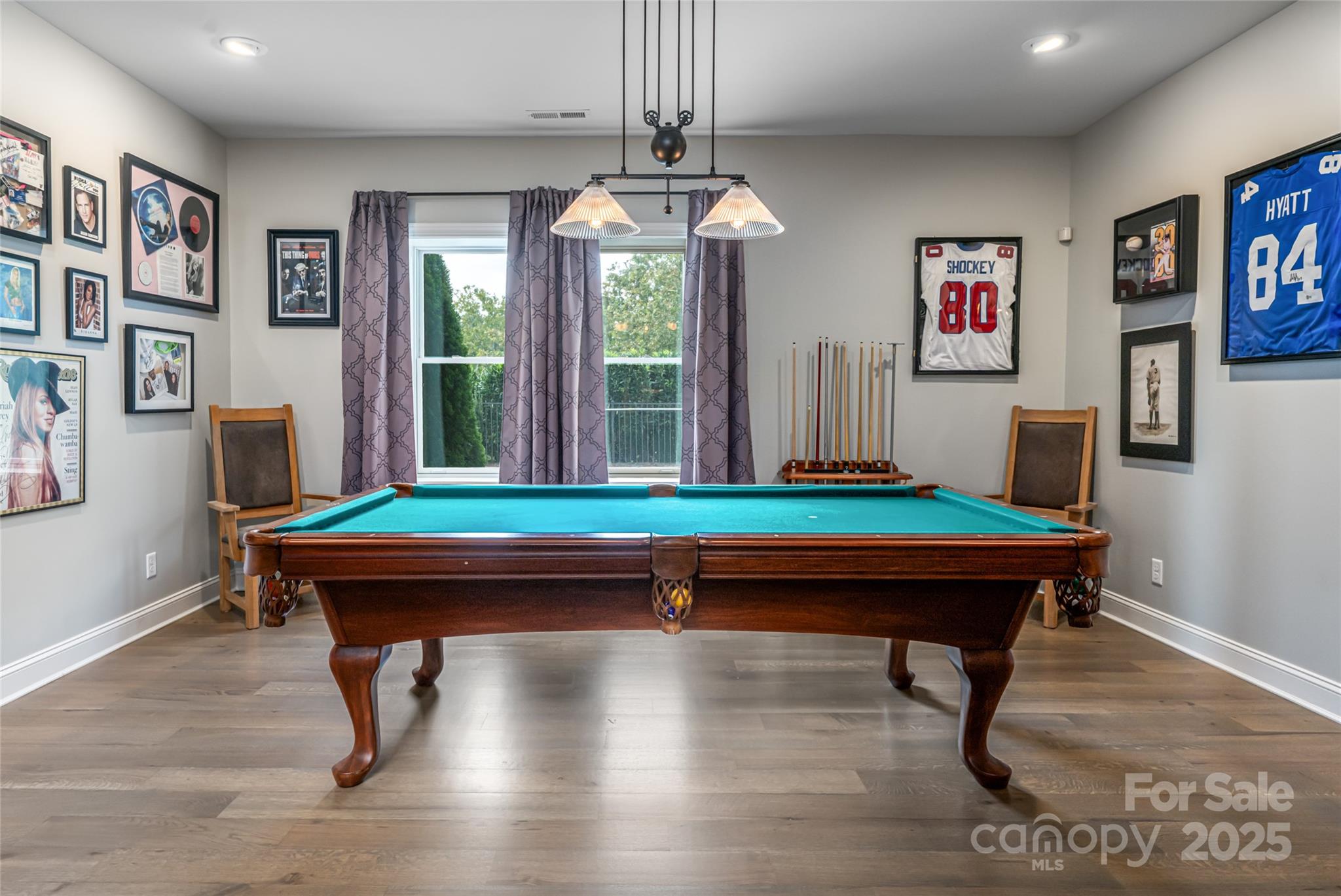 64 Waterhill Way Fletcher, NC 28732 - Photo 28 of 48 a room that has a table chair and a large window