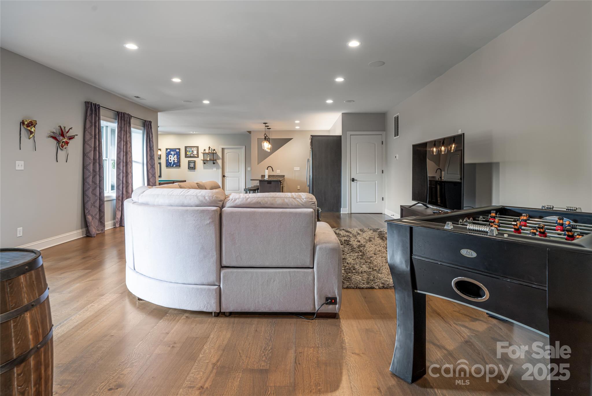 64 Waterhill Way Fletcher, NC 28732 - Photo 30 of 48 a living room with furniture and a flat screen tv