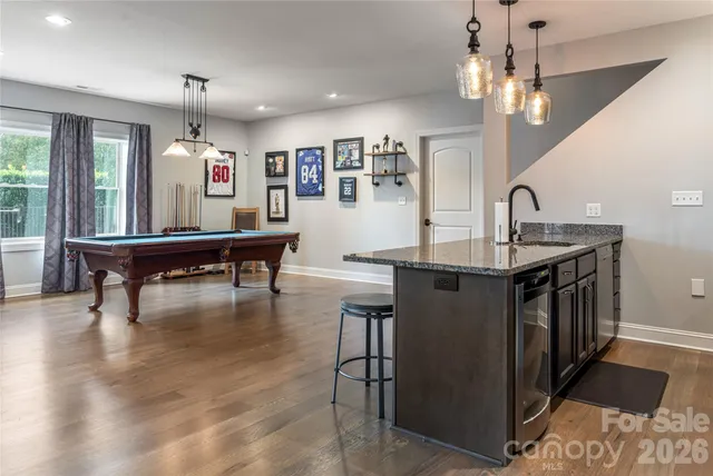 a view of a garden and an ocean view