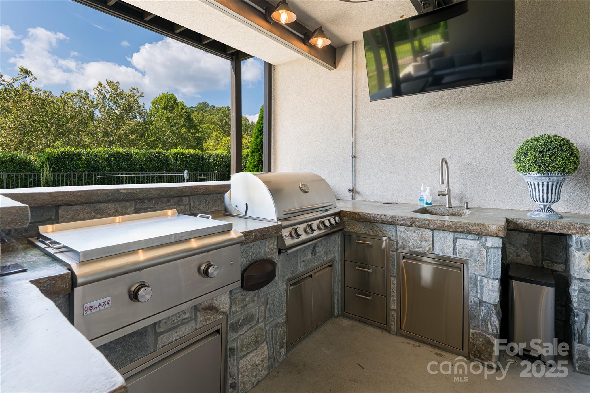 64 Waterhill Way Fletcher, NC 28732 - Photo 43 of 48 a kitchen with a sink stove and microwave