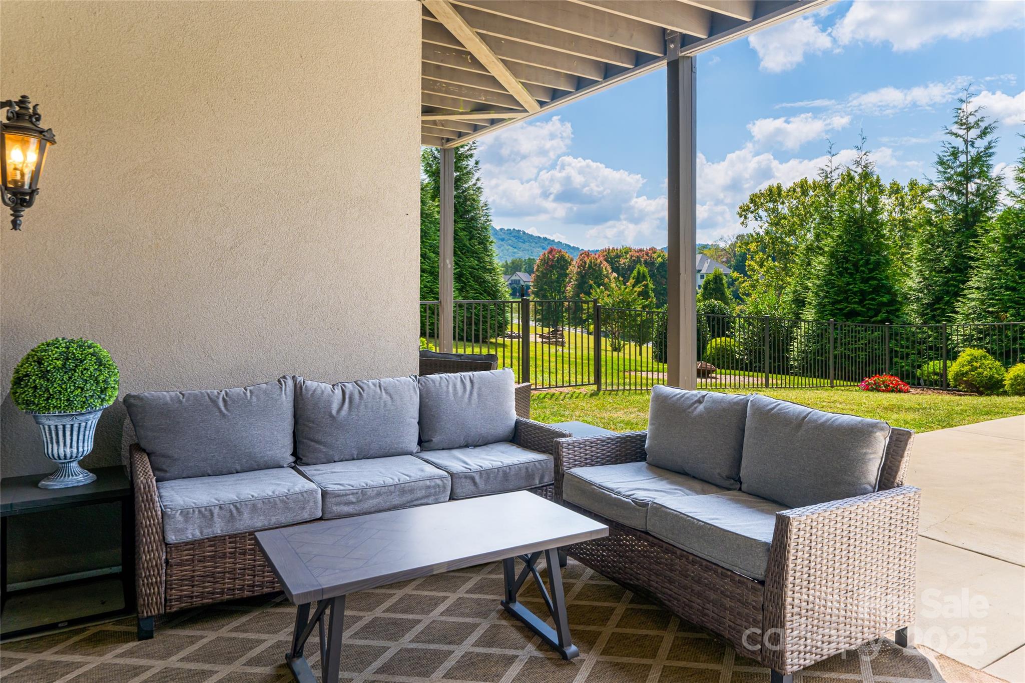 64 Waterhill Way Fletcher, NC 28732 - Photo 45 of 48 a view of a patio with couches chairs and a potted plant