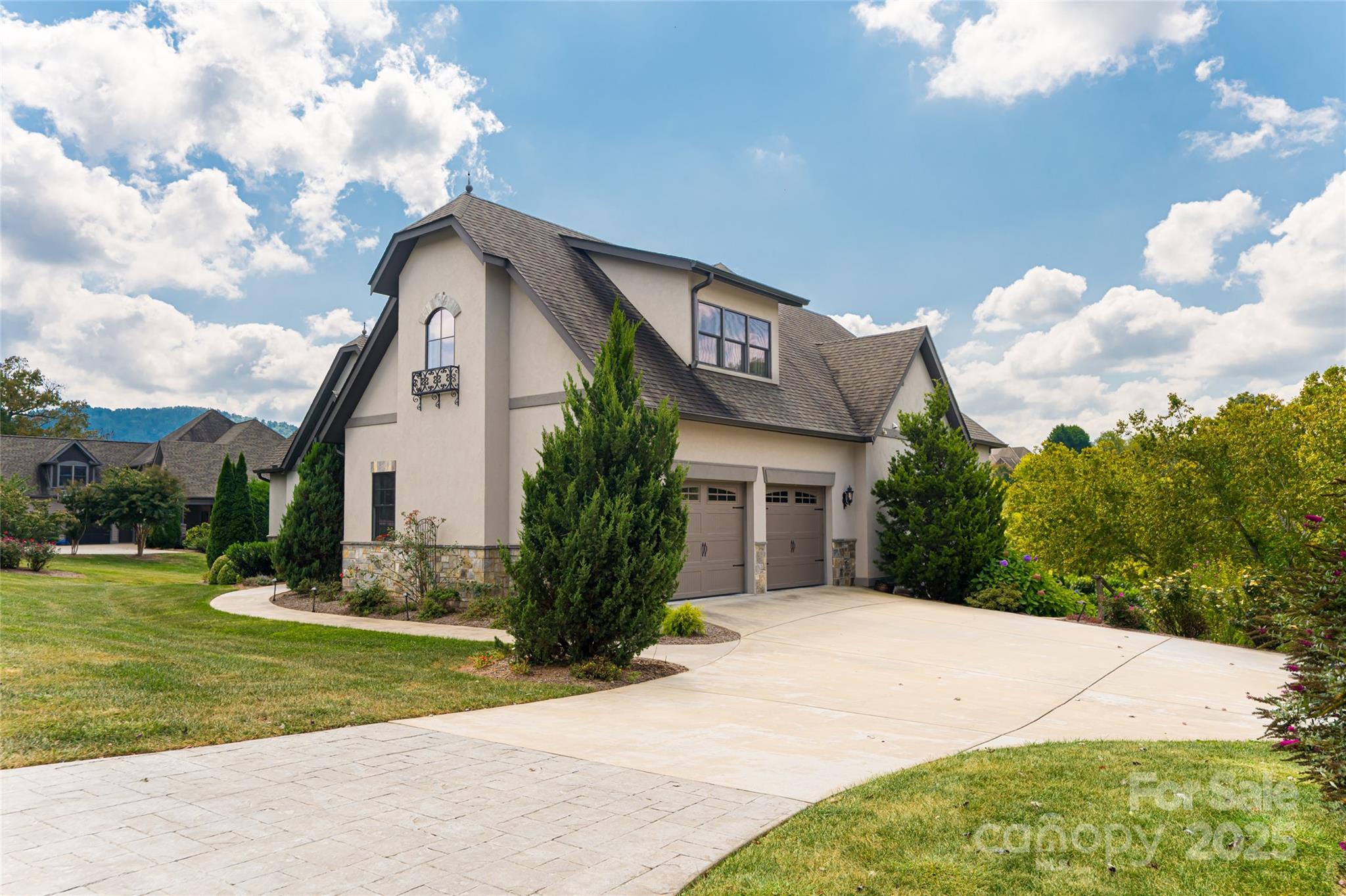 64 Waterhill Way Fletcher, NC 28732 - Photo 5 of 48 a front view of a house with garden