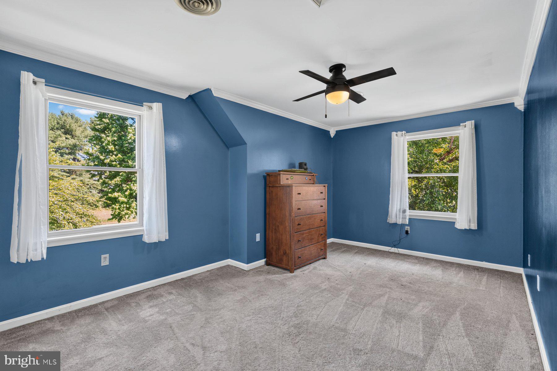 49 Rockland Road Westminster, MD 21158 - Photo 57 of 66 a view of a livingroom with a ceiling fan and window