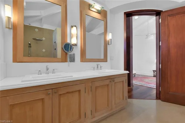 a view of an empty room with a bathroom