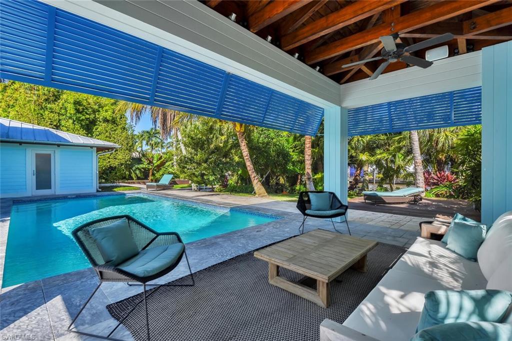 795 18th Avenue South Naples, FL 34102 - Photo 42 of 48 a view of swimming pool with a patio