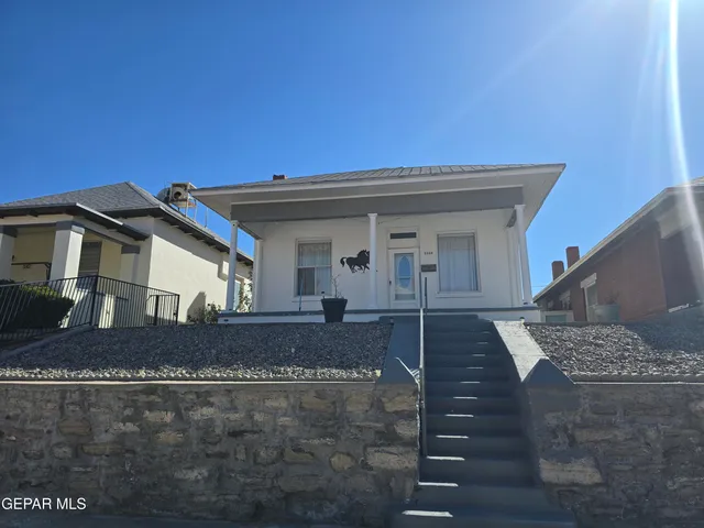 a front view of a house with entertaining space