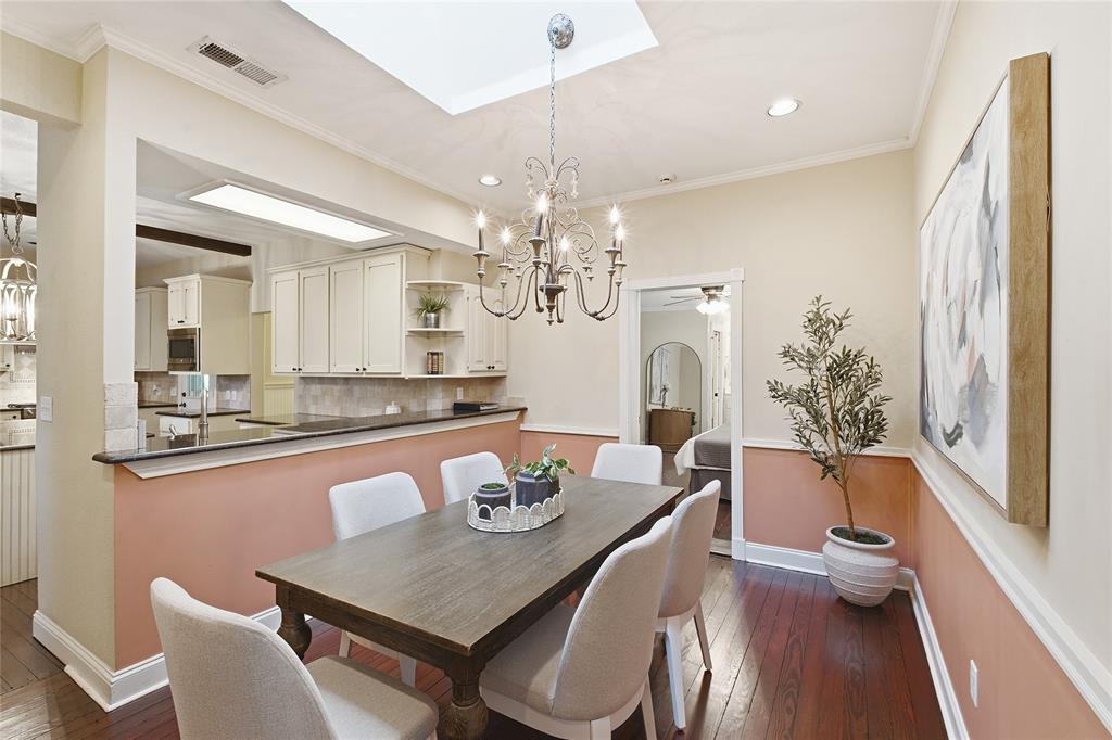 9121 6th Street Frisco, TX 75033 - Photo 11 of 27 a view of a dining room with furniture window and wooden floor
