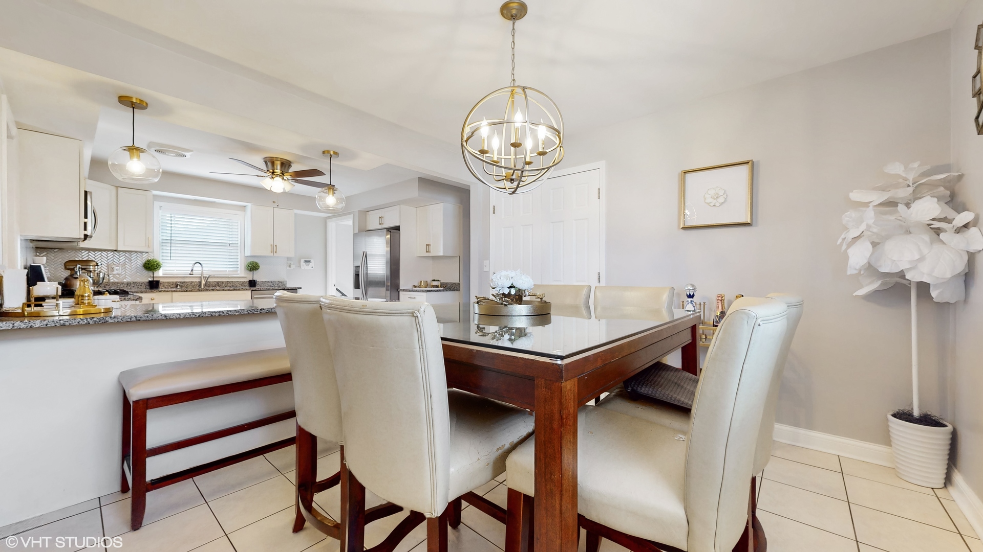 453 High Ridge Road Hillside, IL 60162 - Photo 3 of 20 a view of a dining room with furniture and chandelier