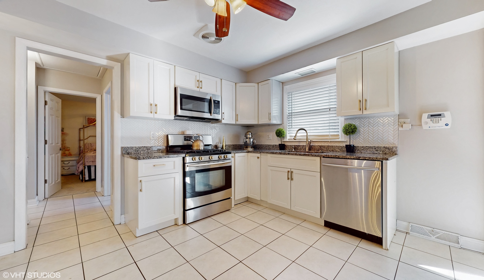453 High Ridge Road Hillside, IL 60162 - Photo 4 of 20 a kitchen with stainless steel appliances granite countertop a refrigerator and a stove